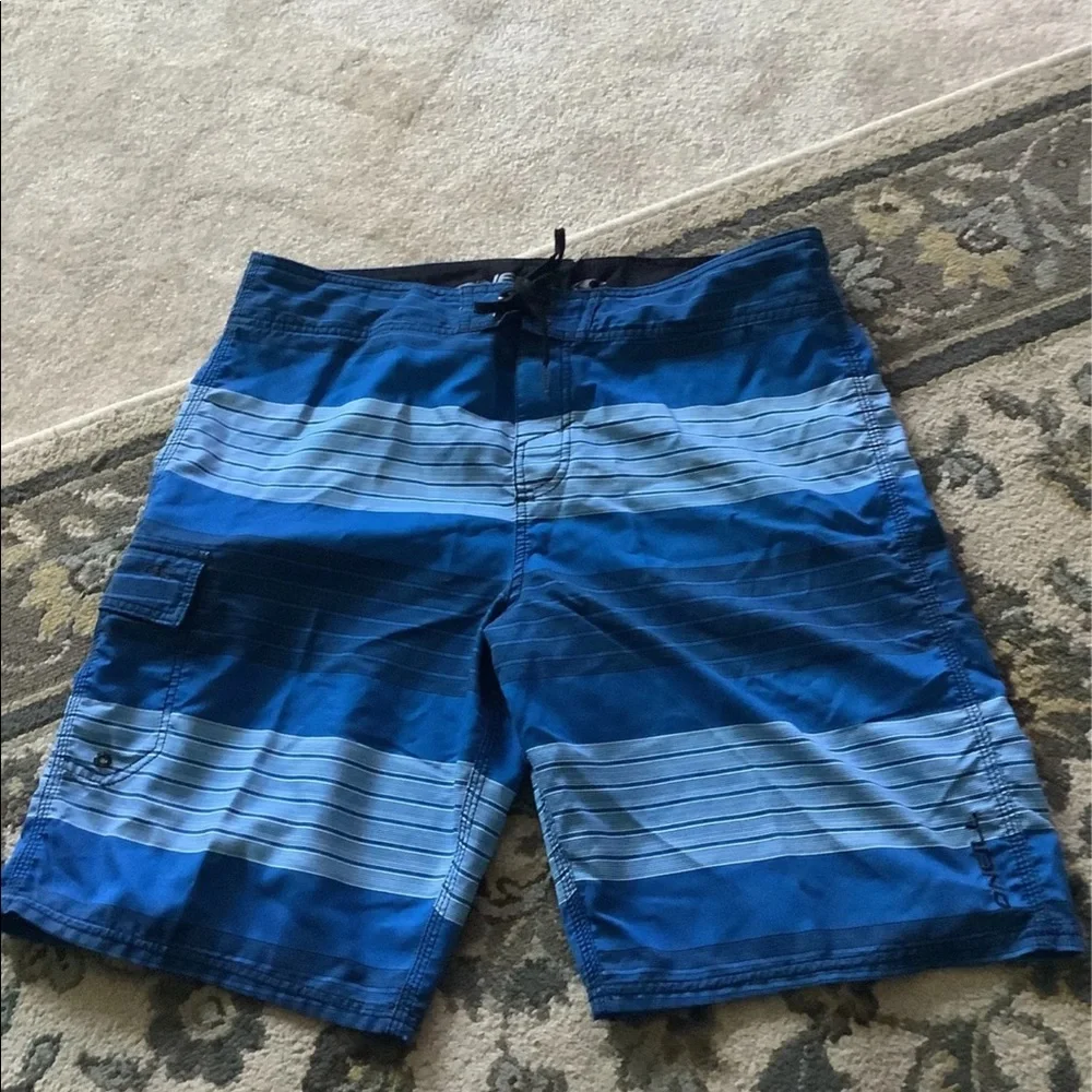 O’Neill board shorts blue black striped 36 waist in great condition. 🏄🏽 - Picture 2 of 13